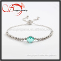 platinum plated bracelet with aquamarine oval glass pandent KG8